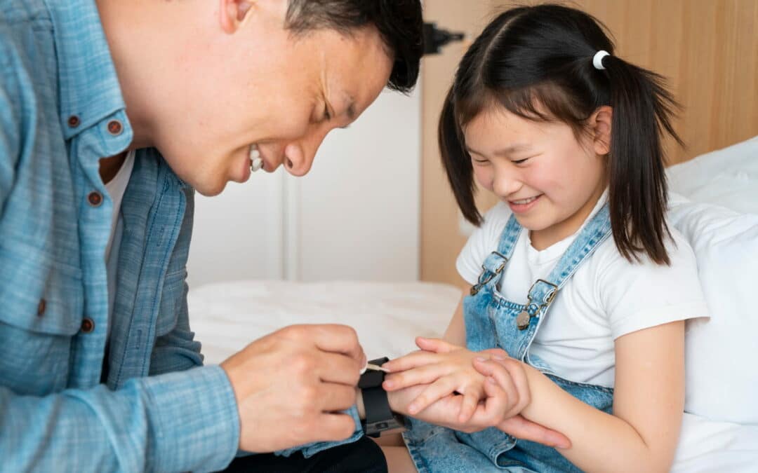 smiley-father-painting-girl-s-nails
